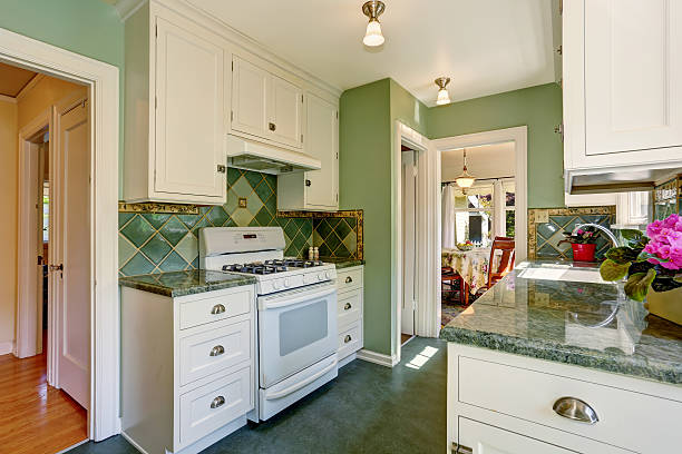 istock Classic American kitchen room interior in green and white tones 589981378