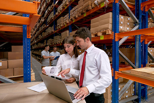 istock Employees checking the storages in warehouse 589981588