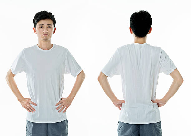 Young man in blank t-shirt against white background.