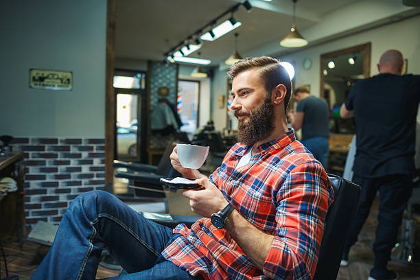 istock Man in barber shop 589983526
