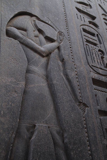 Engraving of God Thoth in Egyptian remple.