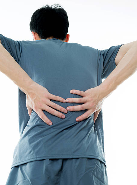 istock Young asian man with back pain 589985730