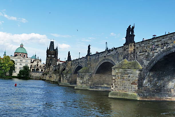 istock Charles Bridge and the Powder Tower in Prague 590034148