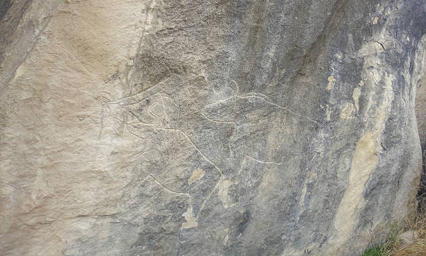 istock Prehistoric drawings. Gobustan National Park (Gobustan Rock Art Cultural Landscape) 590035032
