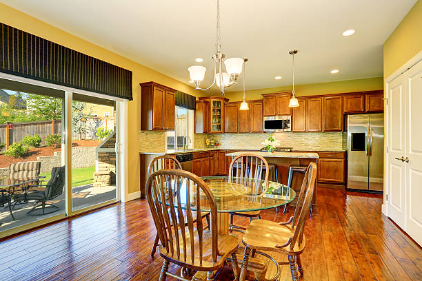 istock Wooden kitchen and dining room interior. 590035210