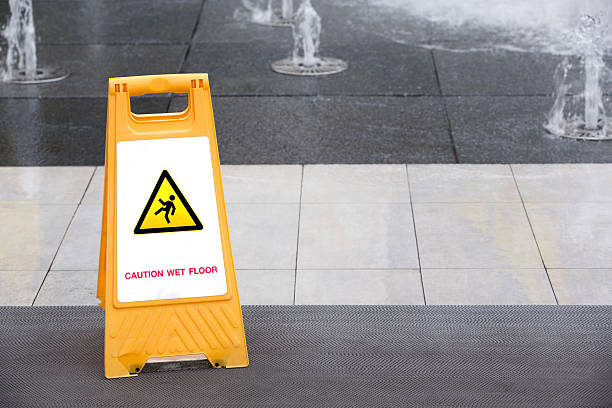 istock Sign showing warning of caution wet floor 590035340