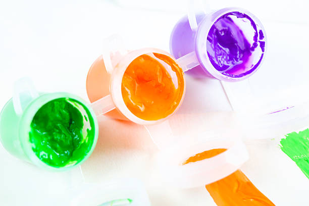 set of colorful paints close-up on white background