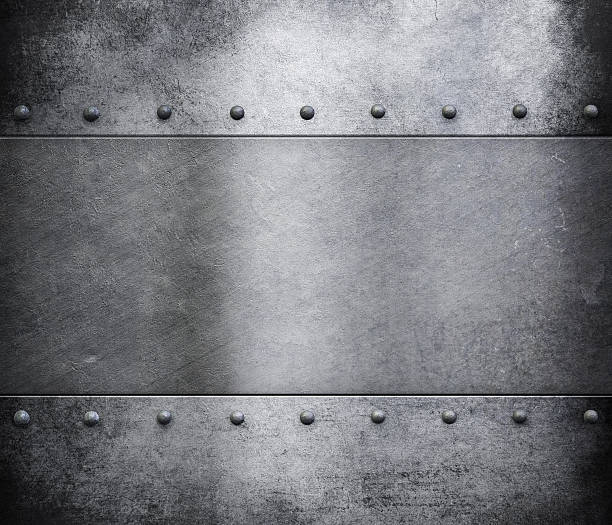 istock grunge metal armour background with rivets 590035860