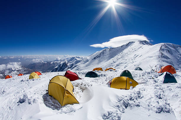 istock Tents in mountains in the winter 590036138