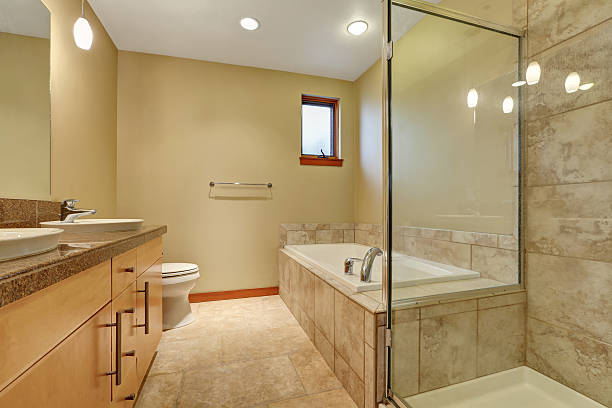 istock Bathroom in beige tones with vanity cabinet 590037066