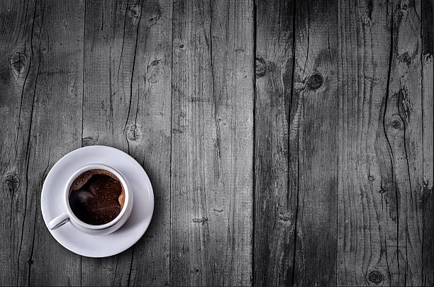 istock Coffee cup top view on wooden table background 590038350