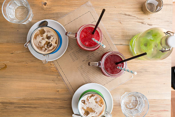 istock Smoothies in the jar aside iced coffee in a bar 590039060