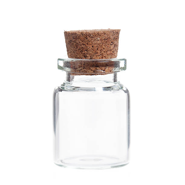 istock Empty glass bottles with cork stopper isolated 590039334