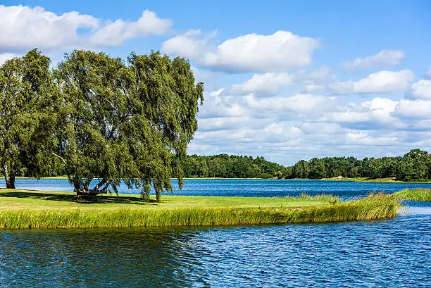 View over the central part of the Swedish coastal city Kalmar looking north over the Fredriksskans canal. Water and nature is integrated as an important part of the city. Not a house in view.