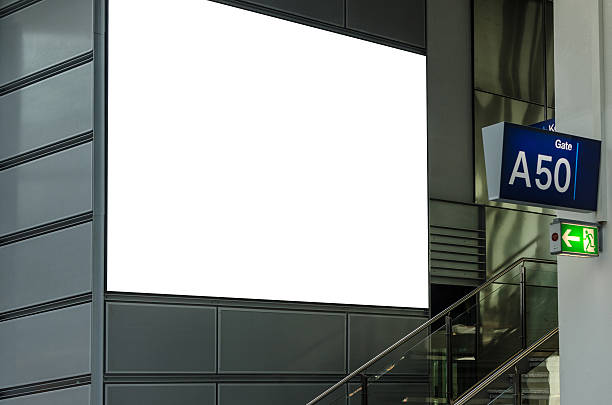 istock White large blank advertising board with copy space in airport 590040998
