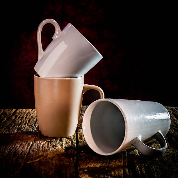 istock still life three cup stacked on wood 590041838
