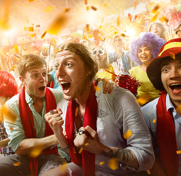 istock Sport fans: Group of cheering fans 590042696