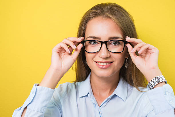 istock Cute young business woman with glasses 590042964