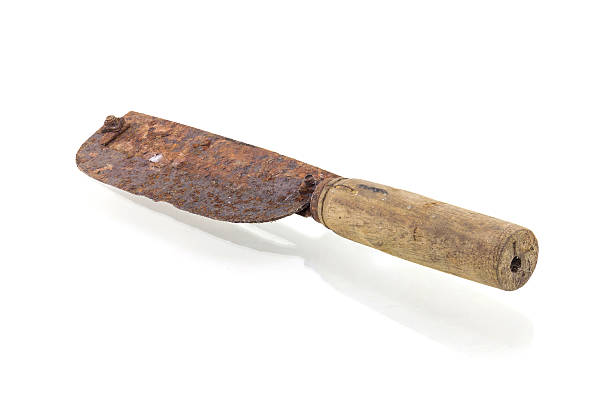istock Old rusty meat cleaver isolated on white background 590044244