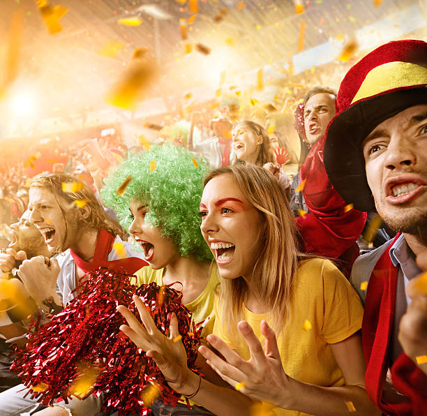 istock Sport fans: Group of cheering fans 590044290