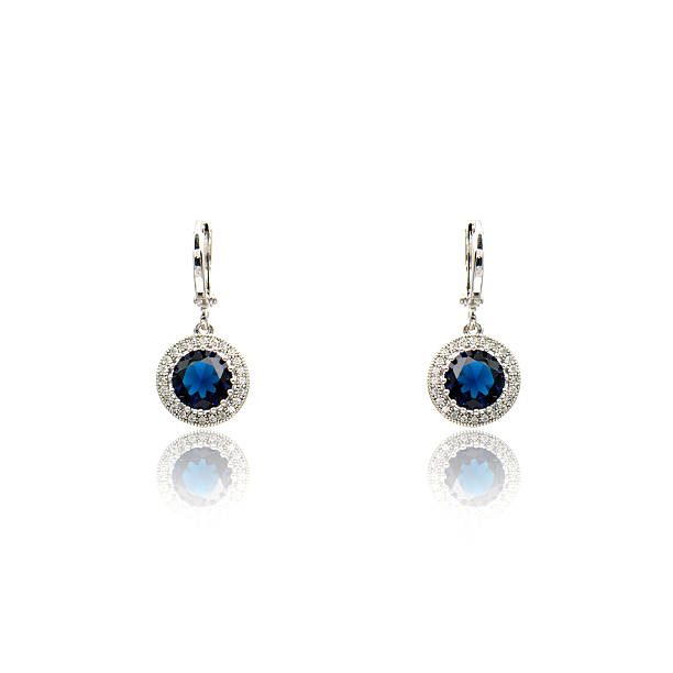 istock Pair of sapphire earrings isolated on white 590044380