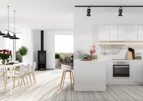 Interior of well designed modern trendy white kitchen, front view