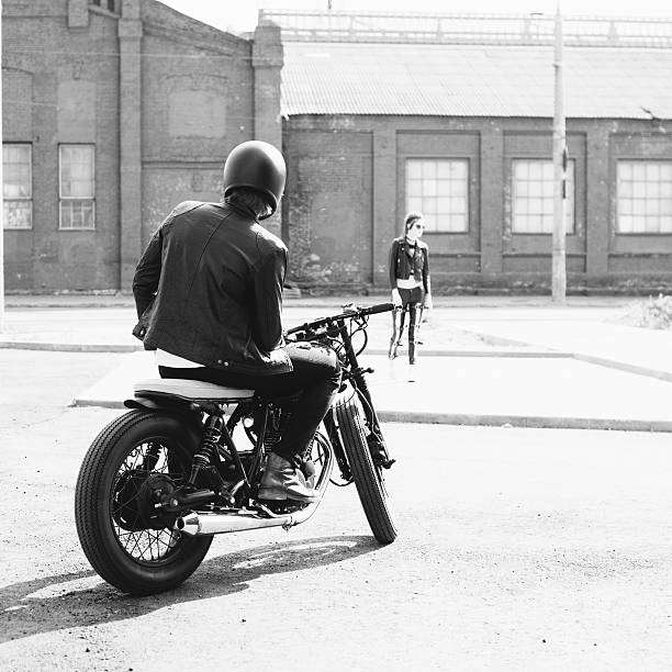 istock Couple in love and vintage custom motorcycle 590046672