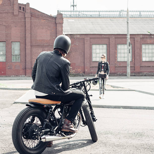 istock Couple in love and vintage custom motorcycle 590046730