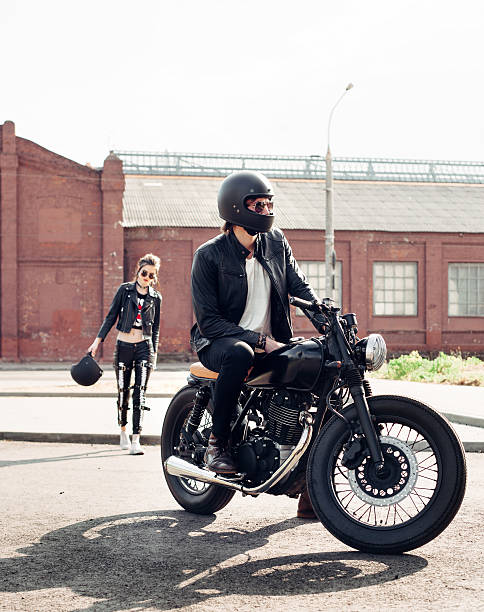 istock Couple in love and vintage custom motorcycle 590046890