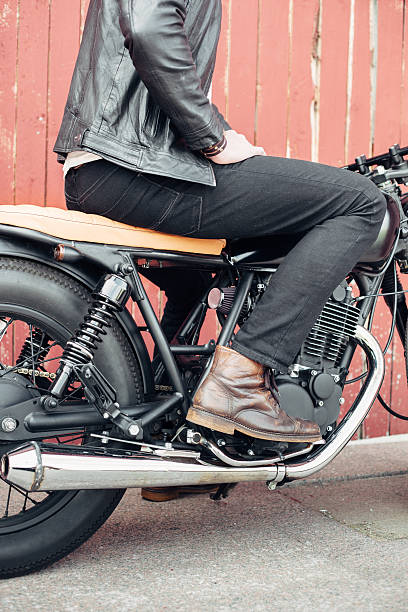 istock Biker and vintage custom motorcycle 590047606