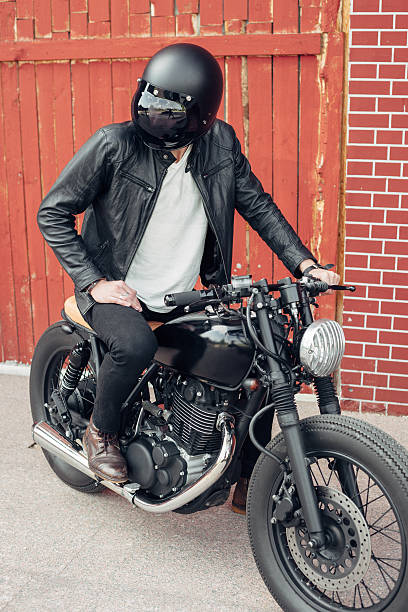 istock Biker and vintage custom motorcycle 590047964