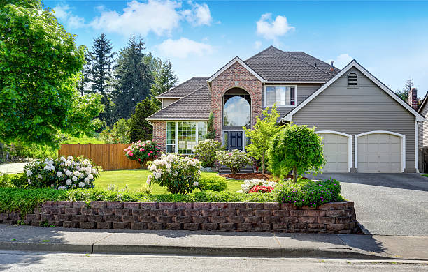 istock Luxury house exterior with double garage. 590051254