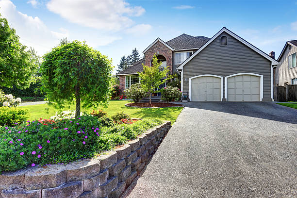 istock Luxury house with brick and siding trim and double garage. 590051558