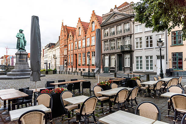 istock Jan Van Eyck statue and square in Bruges 590054762
