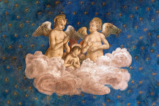 Rome, Basilica di Santa Croce in Gerusalemme: Cherubim angels on the clouds. Fresco paint on the apse by Antoniazzo Romano (1430 - 1508)