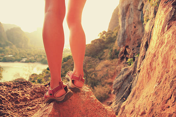 istock young  woman enjoy the view on mountain peak 590056340