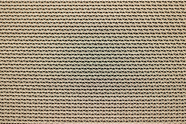 vista lateral de uma pilha de papelão - corrugated cardboard - fotografias e filmes do acervo