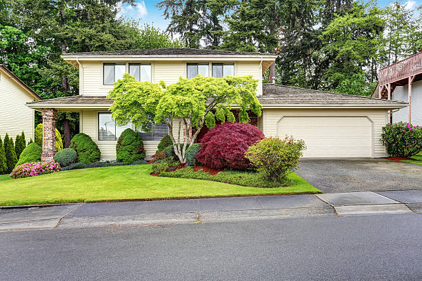 istock Luxury American two story house with siding and brick trim. 590058548