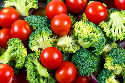 close up Raw vegetables broccoli and tomatoes.