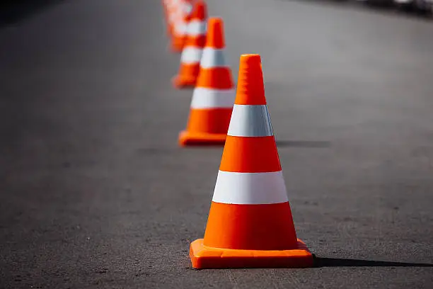 Photo of bright orange traffic cones