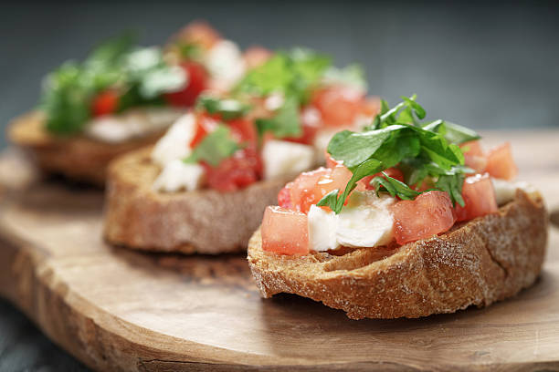 istock homemade bruschetta with cheese and vegetables 590060926