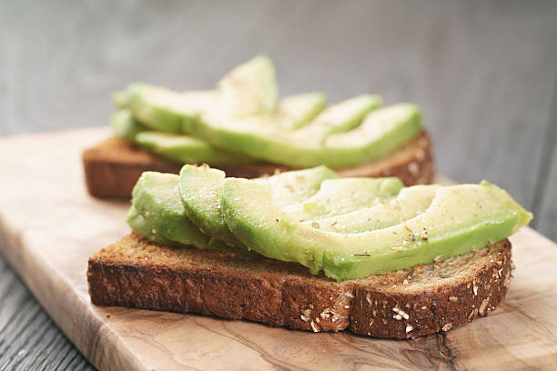 istock open sandwiches with avocado and spices 590061700