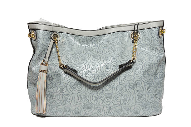 istock female handbag on a white background 590064246