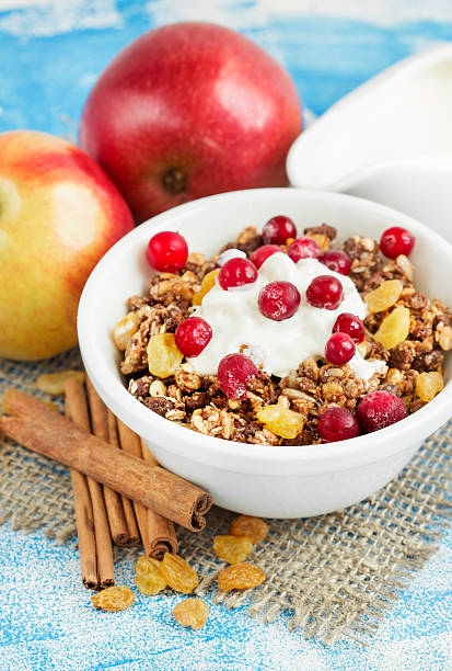 istock Muesli for breakfast, fresh apples and cinnamon, dried fruit 590066078