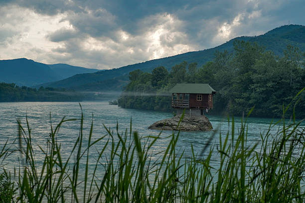 istock House on the river Drina in Bajina Basta. 590070308