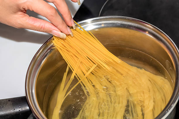 istock boiling spaghetti noodles in the pot 590071896