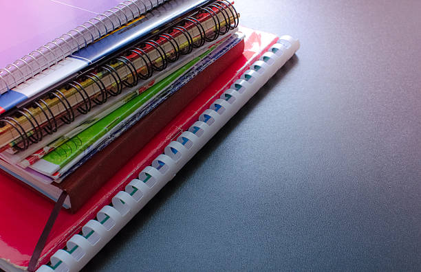 istock School supplies on blackboard background 590072446