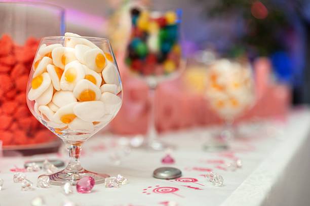 Horizontal color close-up image of wedding candy bar buffet table and decoration.
