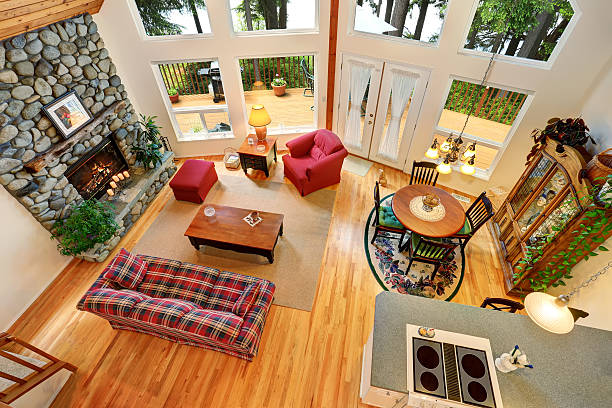 istock Open floor plan living room interior with rocks trim fireplace 590073840