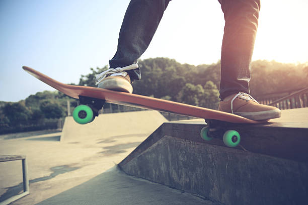 istock young skateboarder legs skateboarding at skatepark 590075050